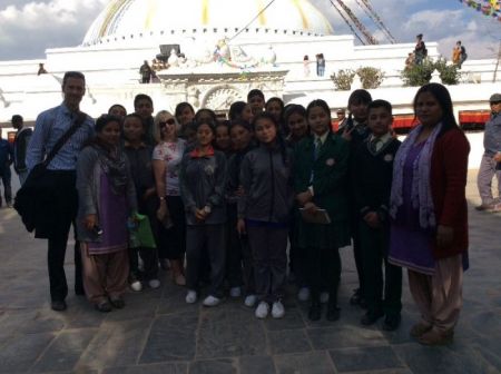 Staff and pupils pictured before boarding the bus back to school.