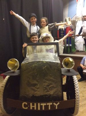 The Potts family and Truly Scrumptious in Chitty.