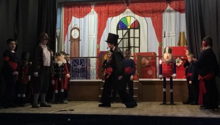 The Childcatcher and soldiers arrive at the Toymaker's house.